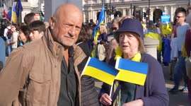 Front view of a couple at London Stands with Ukraine: March and Vigil in Trafalgar Square