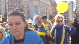 People walking around at the London Stands with Ukraine: March and Vigil