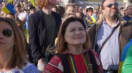 Woman watches stage at the London Stands with Ukraine: March and Vigil another view