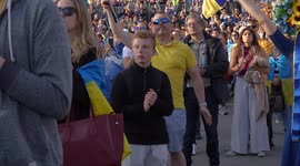 Young boy watching stage at the London Stands with Ukraine: March and Vigil