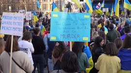 People holding placards at the London Stands with Ukraine: March and Vigil