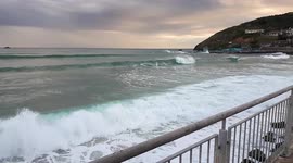 Large waves crashing in to the esplanade in Dunedin, New Zealand