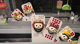Cool cakes shaped like pandas and cartoon characters in Chengdu shop, China