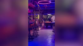 Surprised bar-goers find little girl copying coyote dancer in Thailand