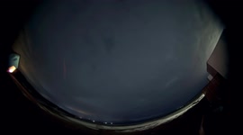 Spooky Northern Lights appear from behind clouds in Iceland in stunning 4K time-lapse