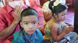 Thai twins get married in Buddhist ceremony to 'cleanse bad luck from past lives'