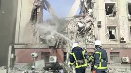 Ukraine emergency services rescue residents from 9-storey building hit by air strike in Mykolaiv