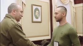 Ukrainian soldier who told Russian warship to 'go f*** yourself' given award after being freed from captivity