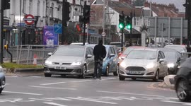 Man Risks His Life To Beg For Money