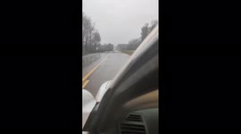 Drive through downed trees and power lines in Mississippi from potential tornado winds