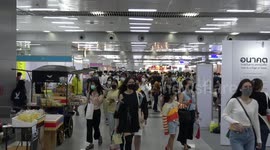 Bookworms browse through hundreds of booths at Thailand's 50th National Book Fair