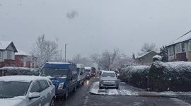 Starbeck high street traffic and snowfall March 31 2022 Harrogate UK