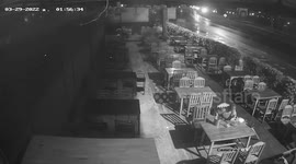 High-speed truck loses control and rams shop 'while drag racing' on wet road
