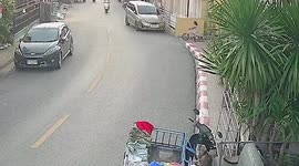 Motorcycle rider hits little girl on bike before crashing into a lamppost