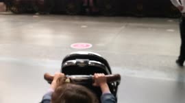 two kids entering National Railway Museum in York, North Yorkshire, UK