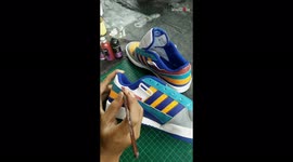 Artist redesigns colour scheme of Adidas trainers in satisfying footage
