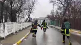 Ukrainian emergency officials inspect Irpin, a city retaken from Russia but now lies in ruins