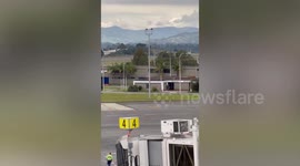 Sparks fly from Airbus A320 plane making emergency landing in Colombia