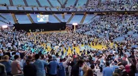 US: Fans Storm Court At Watch Party As UNC Wins NCAA Men’s Basketball Semifinal