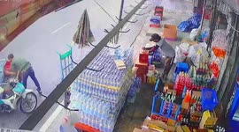 Dramatic moment shop workers dodge out-of-control pickup as it crashes into convenience store