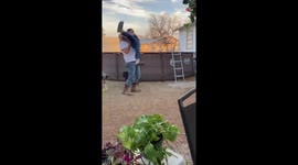 Texan dad tries and FAILS to throw daughter into pool