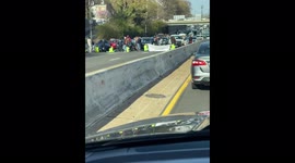 Climate activists block I-395 in Washington, D.C. protesting Biden administration’s stance on drilling fossil fuels on indigenous lands.