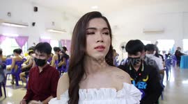 Thai transgender women proudly show medical certificates exempting themselves from national service