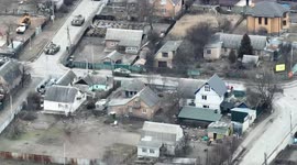 Ukraine war 2 years on: Drone footage appears to show Russian tank firing towards civilian cyclist in Bucha