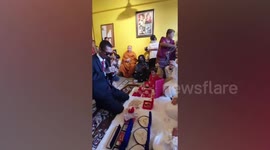 Thai man marries THREE WIVES at the same time in a bizarre wedding ceremony