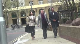 Tennis star Boris Becker and his partner arrive at London court for bankruptcy trial