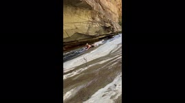 Adventurer discovers 'natural water slide' while hiking in mountains