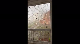 Intensely frightening footage shows fierce, ferocious winds ripping through Georgia during tornado-spawning storms