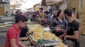 Palestinians crowd markets in West Bank during Ramadan amid soaring priced