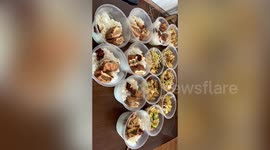 Woman delivers meals for truck drivers stranded on highway due to COVID-19 restrictions