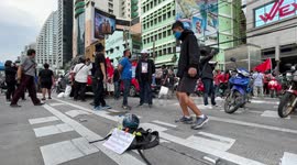 Thai boy spotted doing keepy-uppy with football and toilet rolls at anti-government protests