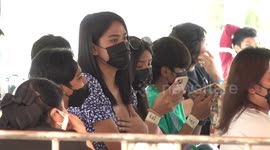 Thai transgender women proudly show medical certificates exempting themselves from national service