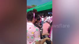 Leni Robredo supporters do K-pop dance under scorching sun at election rally for Philippine president hopeful