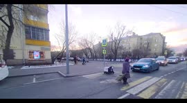 Sweet helpful grandma helps delivery robot cross street in Moscow