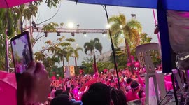 Energetic crowd unfazed by bad weather as they hold election rally for Philippine vice president