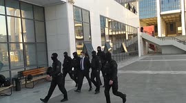 Greek pilot arrives at court in Athens accused of killing British wife