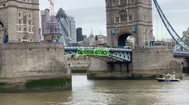 Extinction Rebellion protesters block Tower Bridge in London