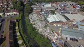 UK residents fuming after 32ft mountain of rubbish grows so tall it can be seen on GOOGLE EARTH