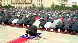 Praying in Skanderbeg Square Tirana, Albania