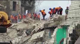 Volunteers from Kyiv help clear ruins in Borodyanka, Ukraine's 'worst hit' town