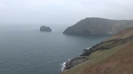 Barrass nose , Tintagel Cornwall, a generic video of a cove i dive in on a calm day, nice sea conditions with a small island