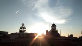 panoramic view of the roofs of the gothic quarter of Barcelona, with the palace of the generalitat and the cathedral at dawn,