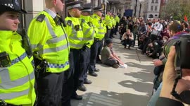 London police guard buildings against climate protesters