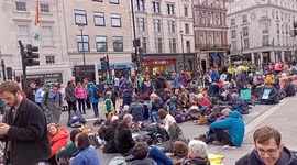 Extinction Rebellion block traffic at Trafalger Square, London