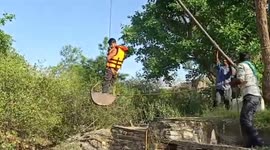 Python rescued after falling into a well at a village of Rajasthan in India