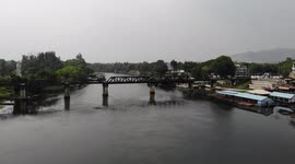 River Kwai bridge quiet as locals start Songkran new year holiday in Thailand